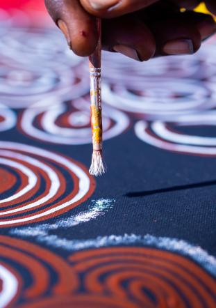 hand with paintbrush